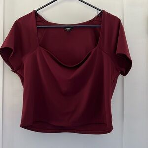 Express XL like new body contour wine colored top. Slightly cropped